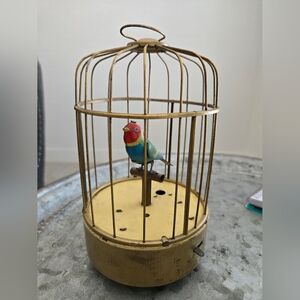 Vintage Gold Bird Cage with Colorful Bird